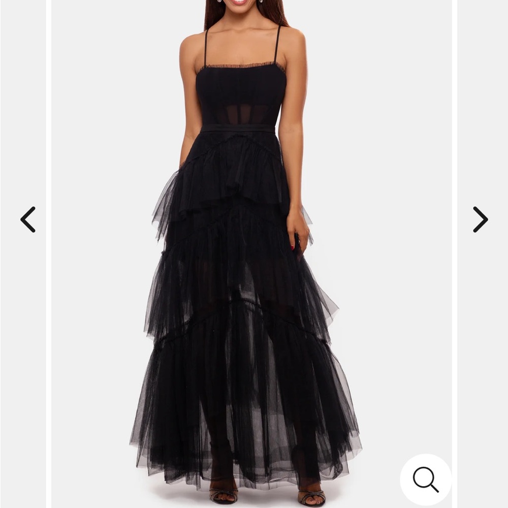 black stunning tiered ruffle gown with a sexy corset top.